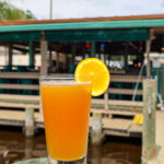 orange drink with orange garnish