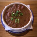 red beans and rice topped with green onions